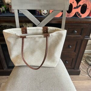 Jen and Co tote bag . Woven style and brown and white colored